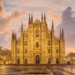 Why do many brands choose Milan for fashion shows?